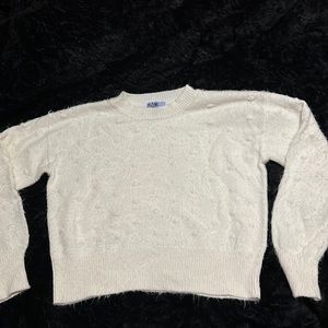 White pullover sweater.